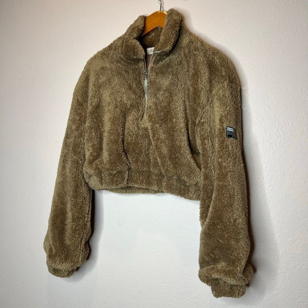 Oh Polly teddy bear chocolate jumper is a cropped, quarter-zip pullover in a coz